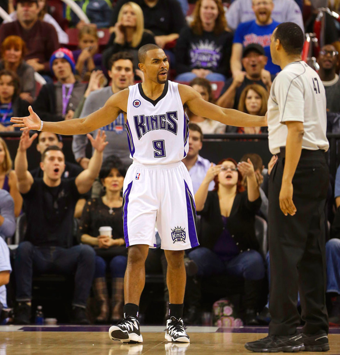 Ramon-Sessions-Bennie-Adams-2015-0208-foul-face-react.jpg